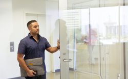 man at office door